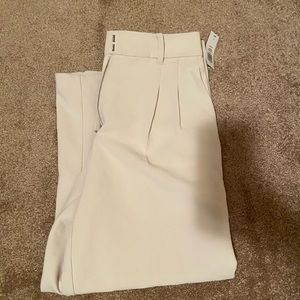 Aritzia Carrot Pants, new with tags, size size 8